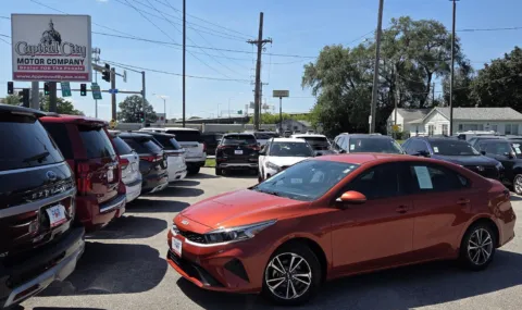 Orange 2023 Kia Forte LXS for sale in Des Moines, IA