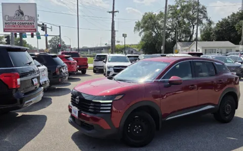 Red 2025 Nissan Kicks SV for sale in Des Moines, IA