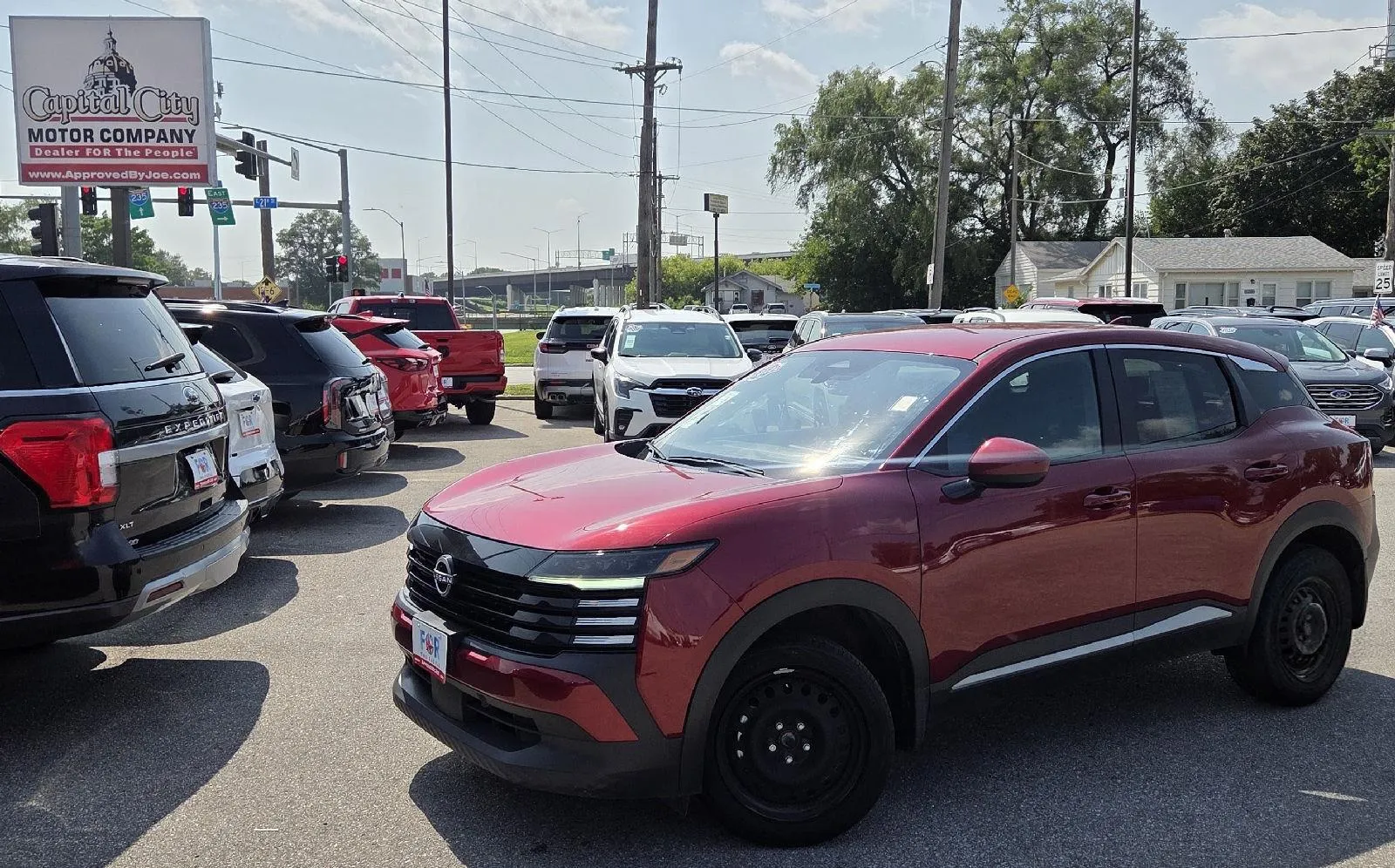 Red 2025 Nissan Kicks SV for sale in Des Moines, IA