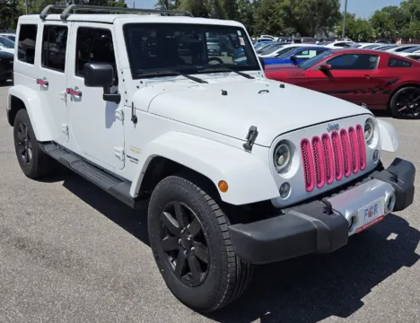 Photos of 2015 Jeep Wrangler Unlimited Sahara for sale in Des Moines, IA at Capital City Motor Company