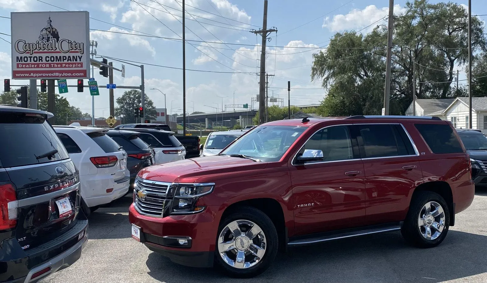 Red 2015 Chevrolet Tahoe LTZ for sale in Des Moines, IA