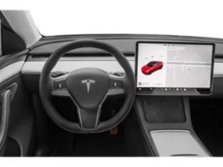 Photos of 2024 Tesla Model Y Long Range for sale in Des Moines, IA at Capital City Motor Company