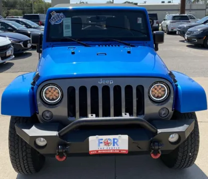 Another view of 2015 Jeep Wrangler Unlimited Freedom Edition for sale in Des Moines, IA at Capital City Motor Company