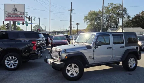 Silver 2013 Jeep Wrangler Unlimited Sport for sale in Des Moines, IA