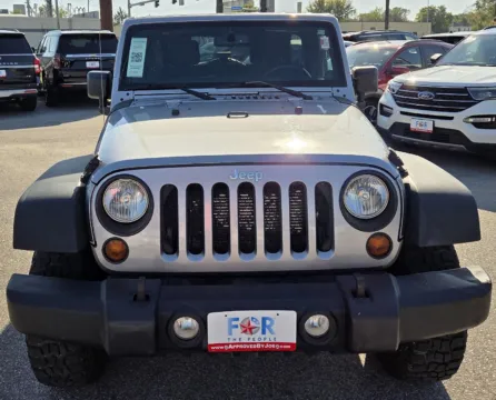 Another view of 2013 Jeep Wrangler Unlimited Sport for sale in Des Moines, IA at Capital City Motor Company