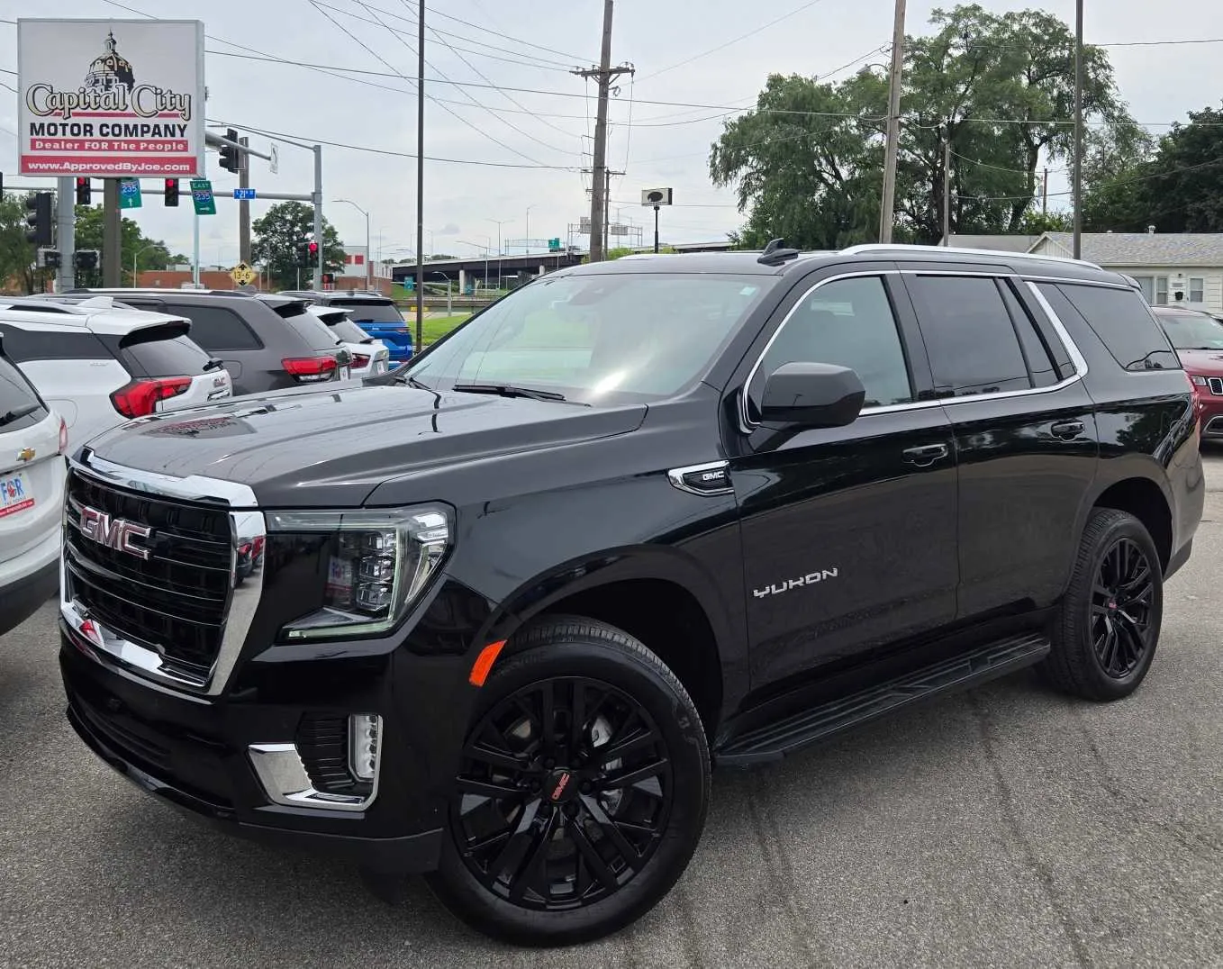 Black 2023 GMC Yukon SLE for sale in Des Moines, IA