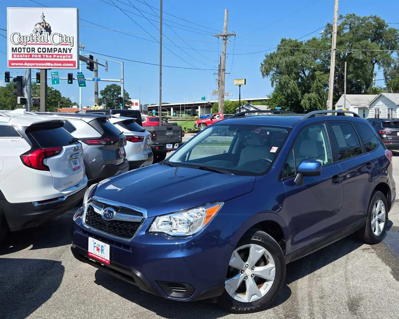 Blue 2015 Subaru Forester 2.5i Premium for sale in Des Moines, IA