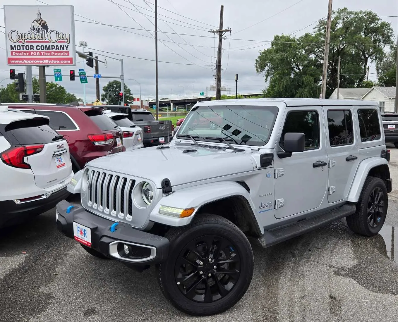 Silver 2023 Jeep Wrangler 4xe Sahara for sale in Des Moines, IA