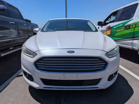 Photos of 2014 Ford Fusion Titanium Hybrid for sale in Twin Falls, ID at Twin Falls Chevrolet