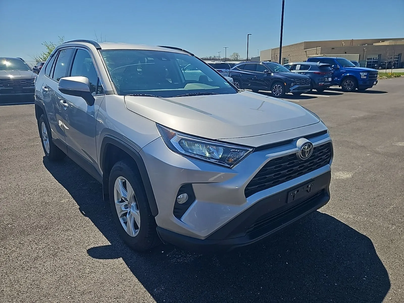Silver 2021 Toyota RAV4 XLE for sale in Wentzville, MO