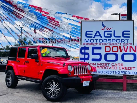 Red 2017 JEEP WRANGLER UNLIMI SAHARA for sale in Hobart, IN
