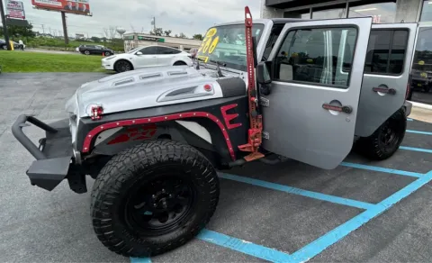 Silver 2016 JEEP WRANGLER UNLIMI RUBICON for sale in Merrillville, IN