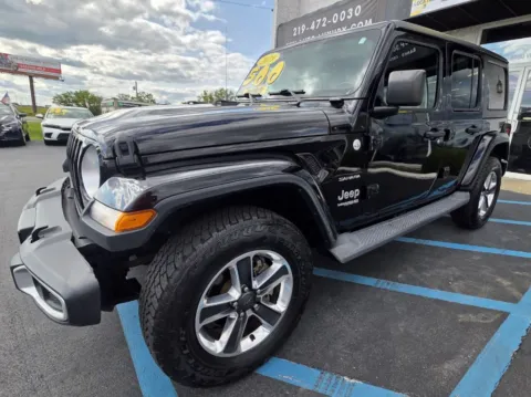 Black 2019 JEEP WRANGLER UNLIMI SAHARA for sale in Merrillville, IN