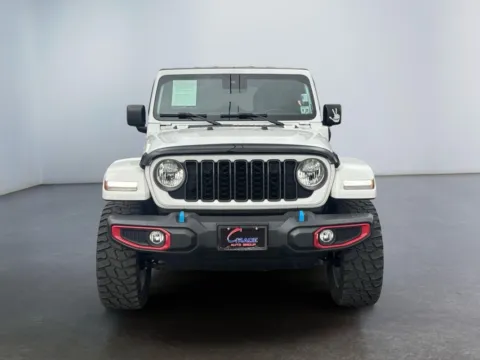 Photos of 2024 Jeep Wrangler 4xe Sport S 4xe for sale in Morrisville, PA at Grace Auto Group