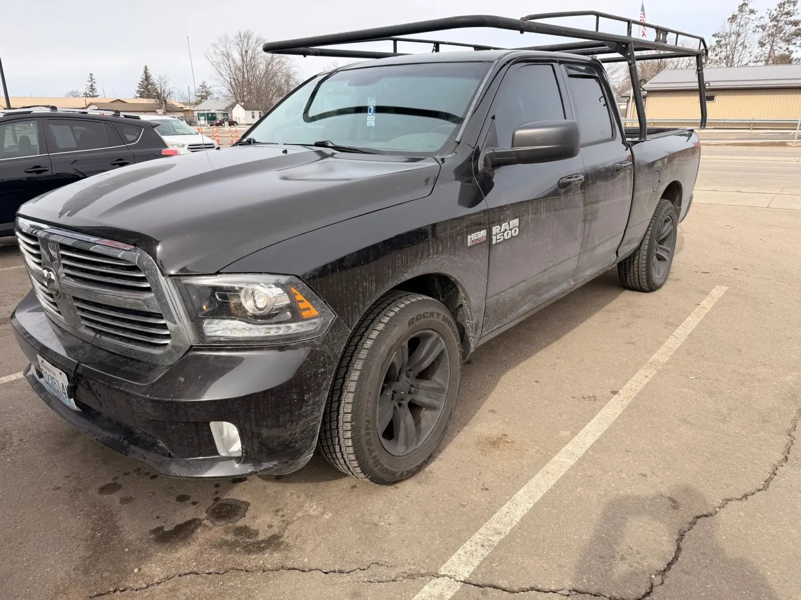 Black 2013 Ram 1500 Quad Cab Sport Pickup 4D 6 1/3 ft for sale in Wadena, MN