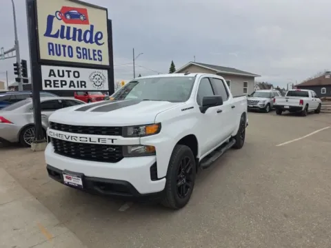 White 2021 Chevrolet Silverado 1500 Crew Cab Custom Pickup 4D 5 3/4 ft for sale in Wadena, MN
