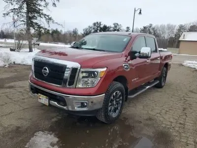 Red 2017 Nissan Titan Crew Cab SL Pickup 4D 5 1/2 ft for sale in Wadena, MN