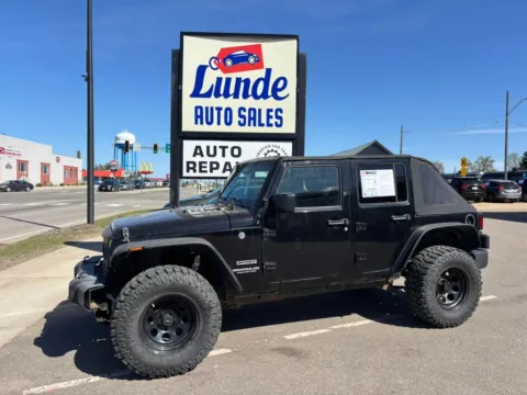Black 2016 Jeep Wrangler Unlimited Sport SUV 4D for sale in Wadena, MN