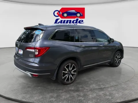 More photos of 2020 Honda Pilot Touring Sport Utility 4D at Lunde Auto Sales Center, MN