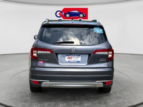 More photos of 2020 Honda Pilot Touring Sport Utility 4D at Lunde Auto Sales Center, MN