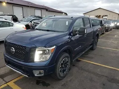 Blue 2019 Nissan Titan Crew Cab PRO-4X Pickup 4D 5 1/2 ft for sale in Wadena, MN