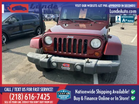 Photos of 2009 Jeep Wrangler Unlimited Sahara Sport Utility 4D for sale in Wadena, MN at Lunde Auto Sales