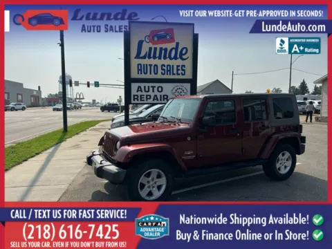 Red 2009 Jeep Wrangler Unlimited Sahara Sport Utility 4D for sale in Wadena, MN
