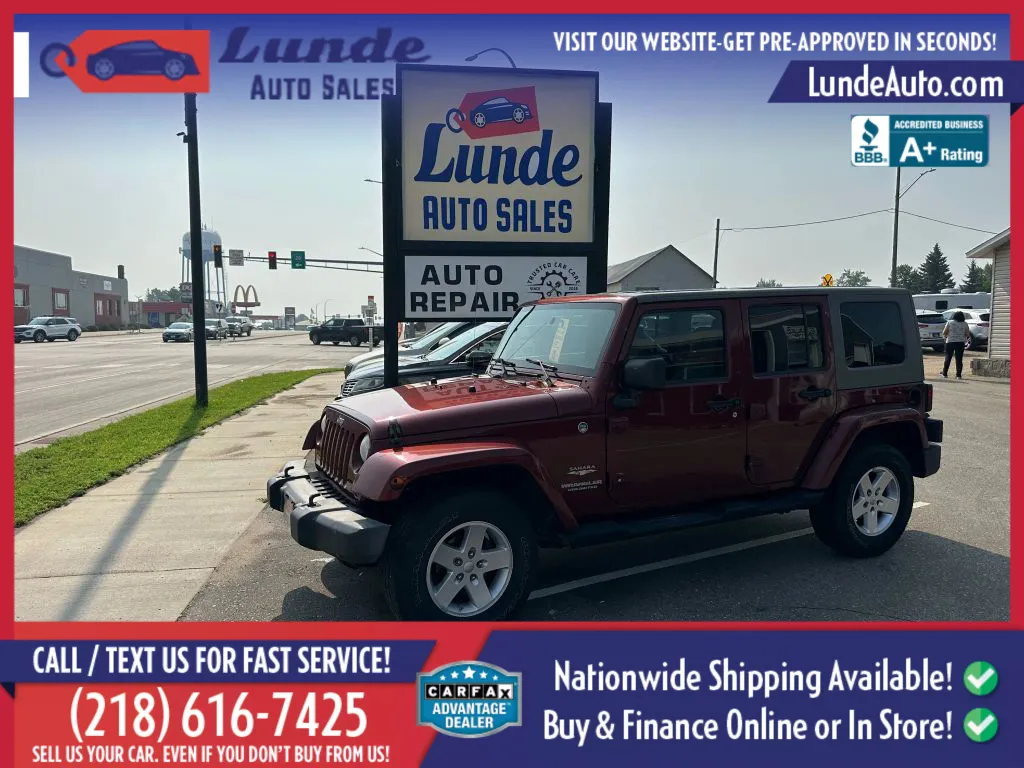 Red 2009 Jeep Wrangler Unlimited Sahara Sport Utility 4D for sale in Wadena, MN