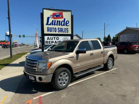 Orange 2013 Ford F-150 SuperCrew Cab Lariat Pickup 4D 5 1/2 ft for sale in Wadena, MN