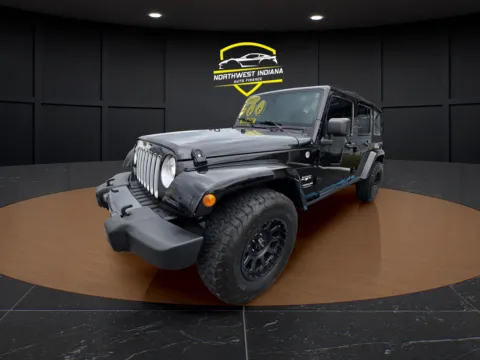 Black 2017 JEEP WRANGLER UNLIMI SAHARA for sale in Merrillville, IN