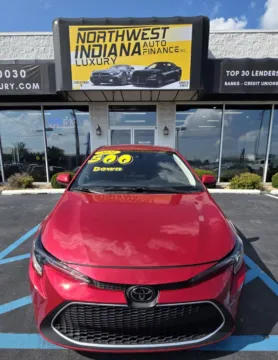 Red 2021 TOYOTA COROLLA LE for sale in Merrillville, IN