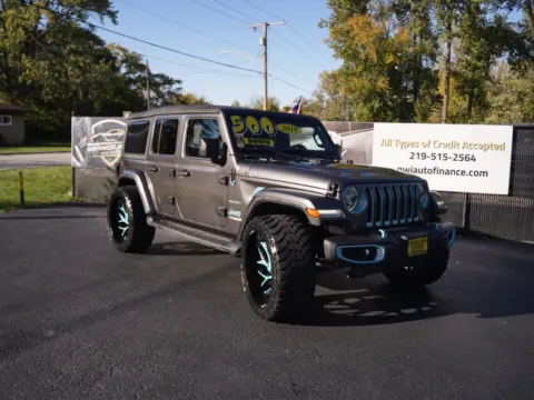 Black 2018 JEEP WRANGLER UNLIMI SAHARA for sale in Schererville, IN