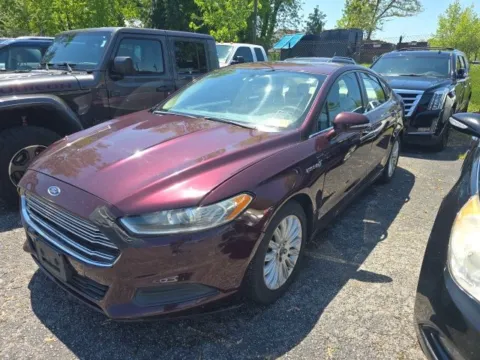 Red 2013 Ford Fusion Hybrid SE for sale in Cockeysville, MD