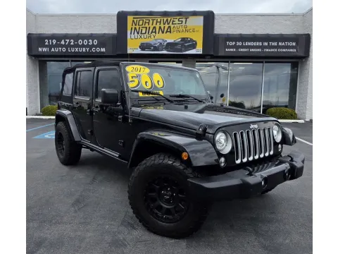 Black 2017 JEEP WRANGLER UNLIMI SAHARA for sale in Merrillville, IN