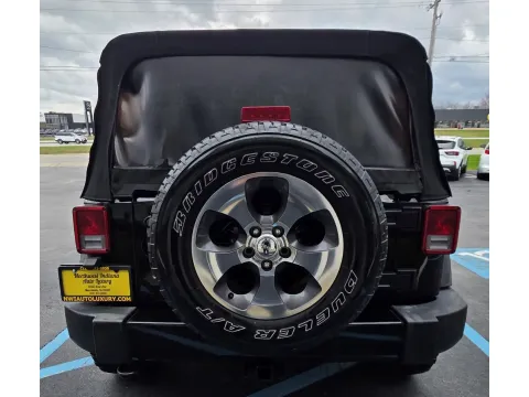 Another view of 2017 JEEP WRANGLER UNLIMI SAHARA for sale in Merrillville, IN at NWI Auto Luxury Merrillville