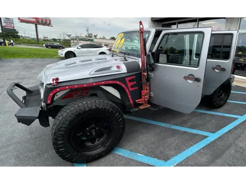 Silver 2016 JEEP WRANGLER UNLIMI RUBICON for sale in Merrillville, IN