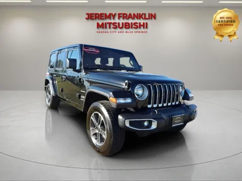 Black 2023 Jeep Wrangler Sahara for sale in Kansas City, MO