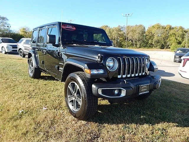 Black 2023 Jeep Wrangler Sahara for sale in Kansas City, MO