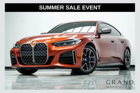 Orange 2024 BMW 4 Series M440i xDrive for sale in Kennesaw, GA