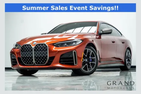 Orange 2024 BMW 4 Series M440i xDrive for sale in Kennesaw, GA