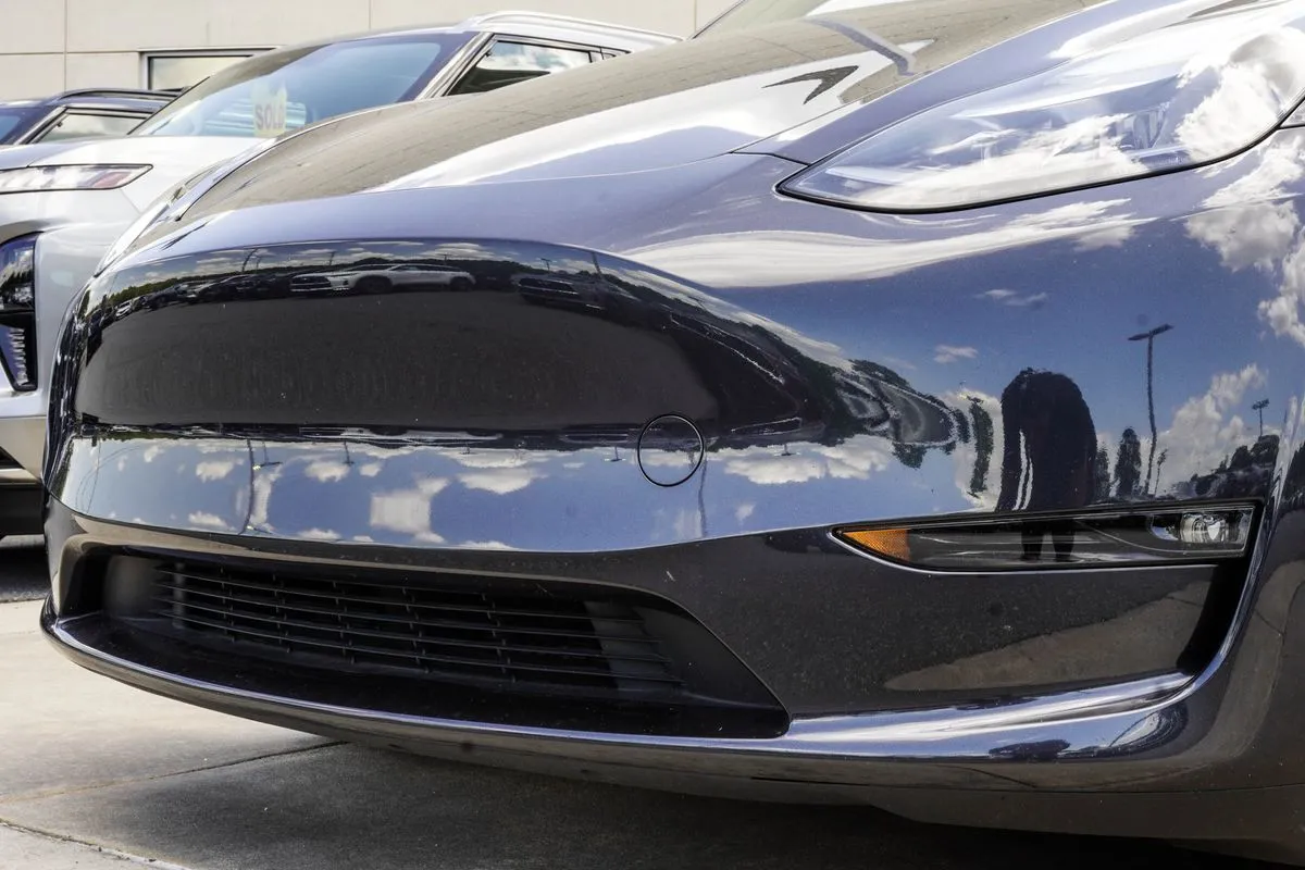 Used 2024 Tesla Model Y Long Range with VIN 7SAYGAEE7RF004492 for sale in Canton, GA