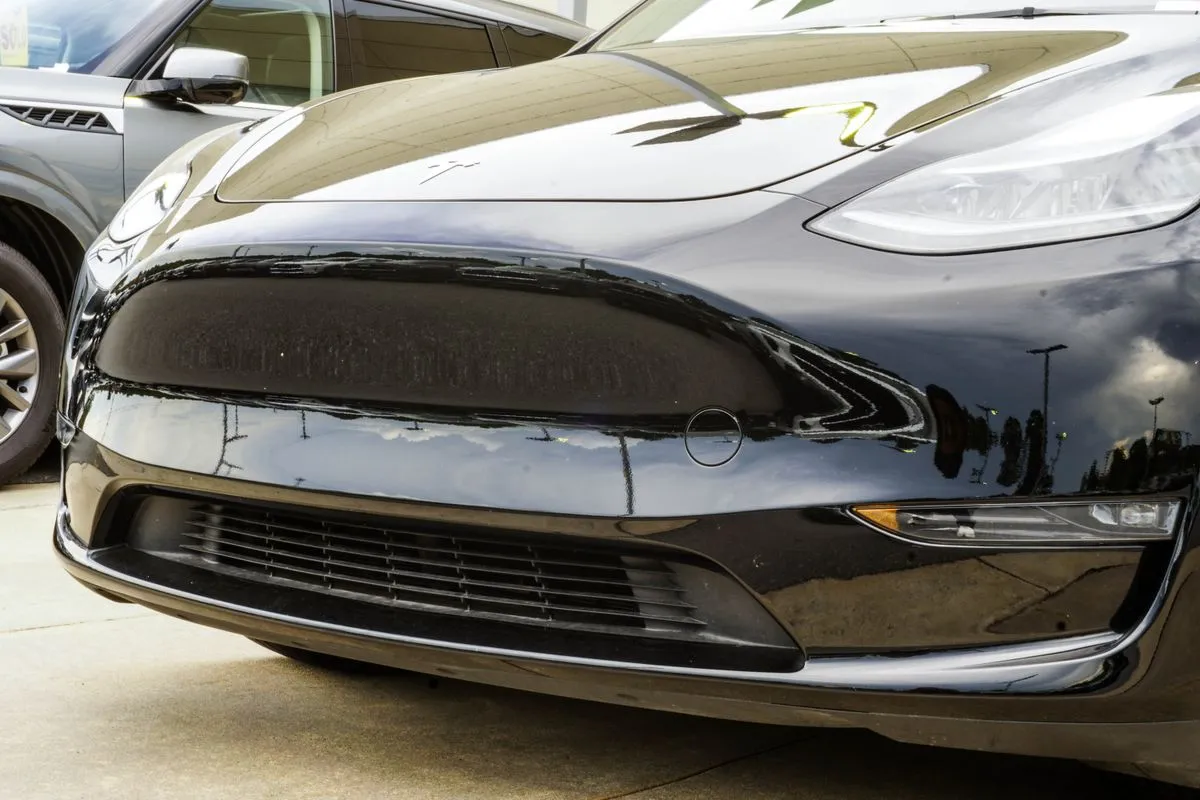 Used 2024 Tesla Model Y Long Range with VIN 7SAYGDEE3RA236182 for sale in Canton, GA