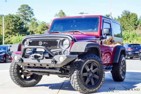 Red 2012 Jeep Wrangler Sahara for sale in Macon, GA