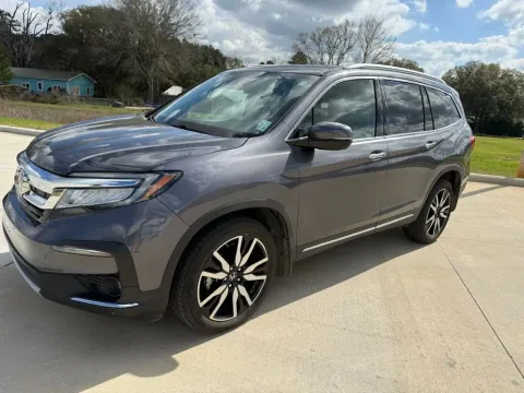 Photos of 2022 Honda Pilot Touring for sale in Deridder, LA at Hixson Toyota