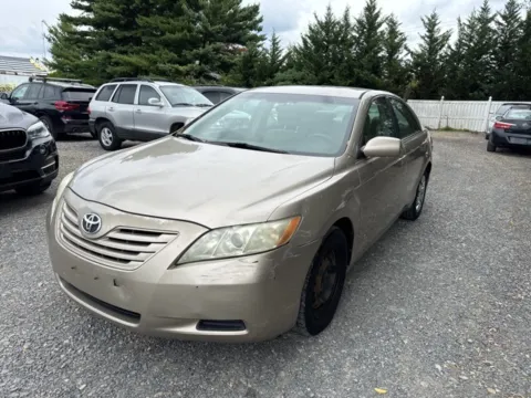 Beige 2009 Toyota Camry LE for sale in Frederick, MD