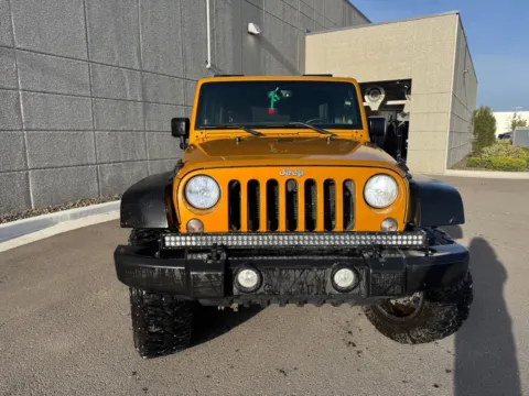 Photos of 2014 Jeep Wrangler Unlimited Sport for sale in Twin Falls, ID at Twin Falls Subaru