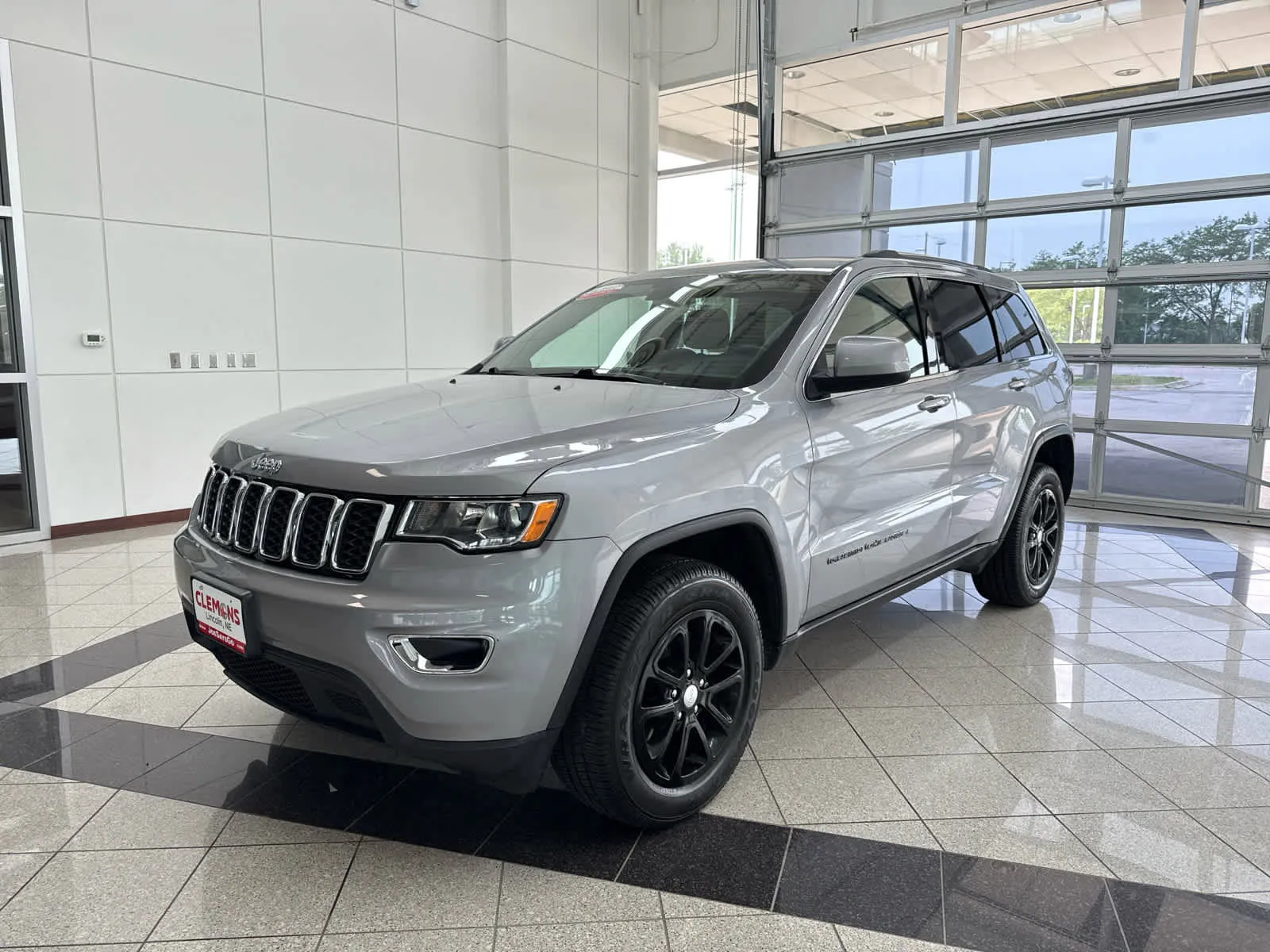 Silver 2021 Jeep Grand Cherokee Laredo E for sale in Lincoln, NE