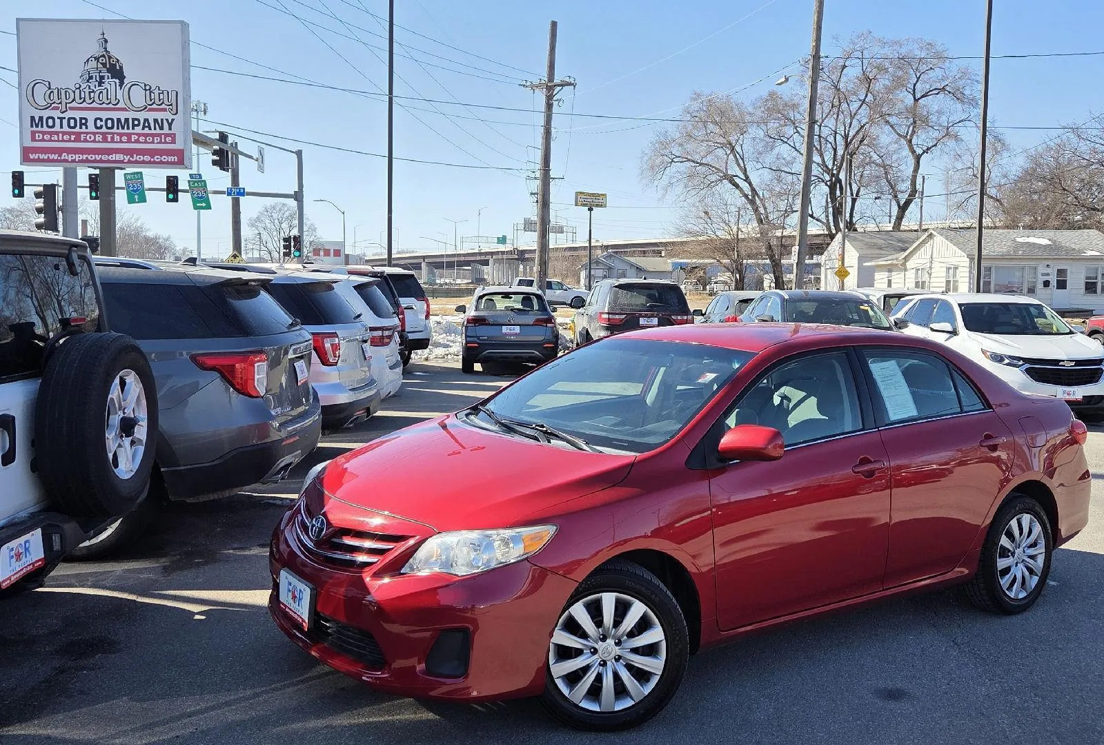 Red 2013 Toyota Corolla LE for sale in Des Moines, IA