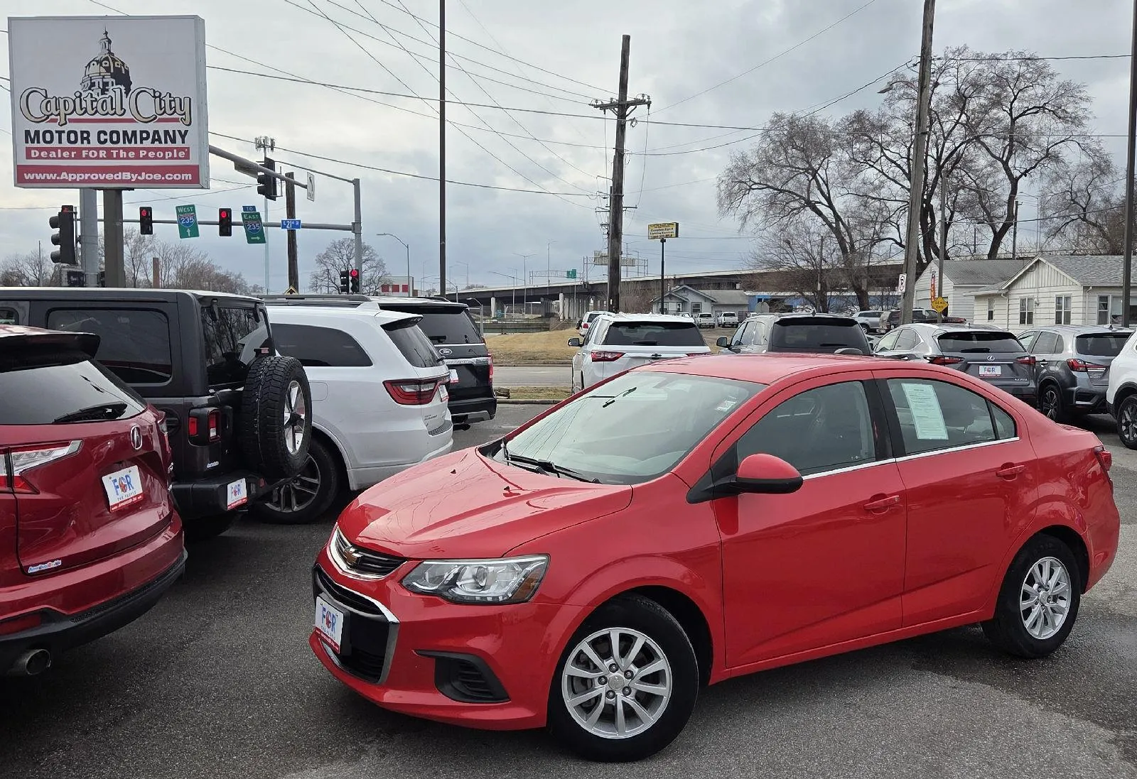 Red 2017 Chevrolet Sonic LT for sale in Des Moines, IA