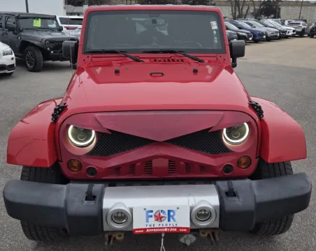 Another view of 2013 Jeep Wrangler Unlimited Sahara for sale in Des Moines, IA at Capital City Motor Company